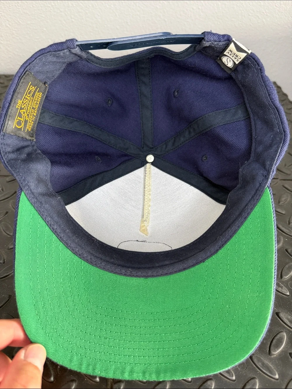 Salty Crew Navy Cap with Yellow-Trim Chasing Tail Patch